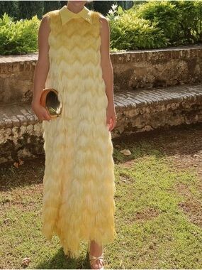 Elegant Yellow Sleeveless Maxi Dress with Feather Texture